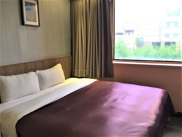 Imagen de la habitación del Hotel Ximen. Foto 5