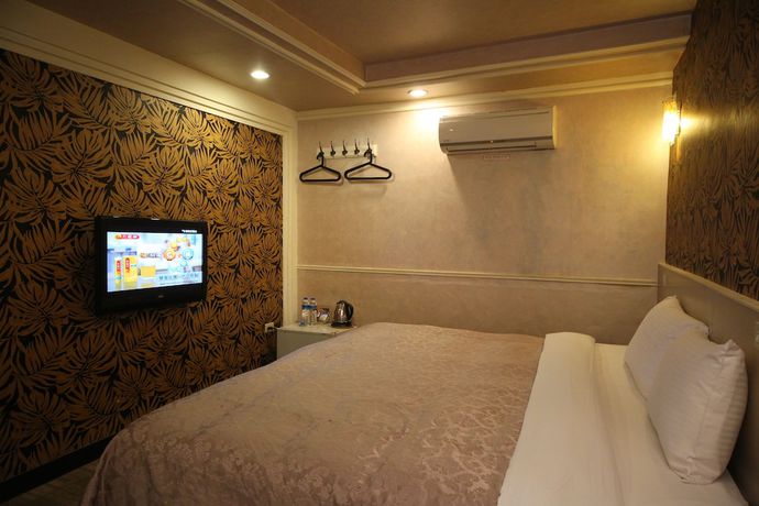 Imagen de la habitación del Hotel Ximen. Foto 6