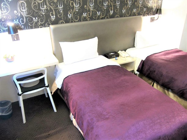 Imagen de la habitación del Hotel Ximen. Foto 7