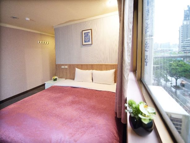 Imagen de la habitación del Hotel Ximen. Foto 8