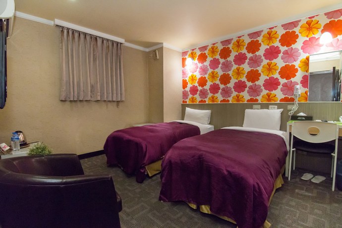 Imagen de la habitación del Hotel Ximen. Foto 9