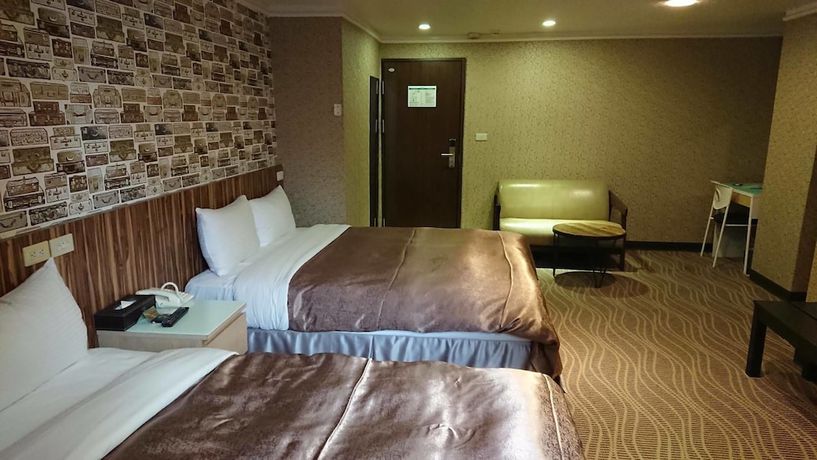 Imagen de la habitación del Hotel Ximen. Foto 13