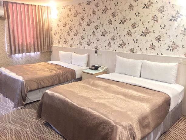 Imagen de la habitación del Hotel Ximen. Foto 14
