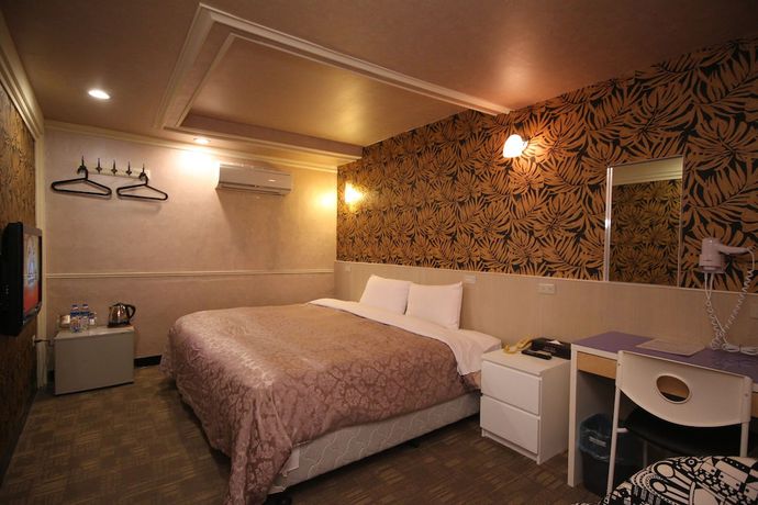 Imagen de la habitación del Hotel Ximen. Foto 16