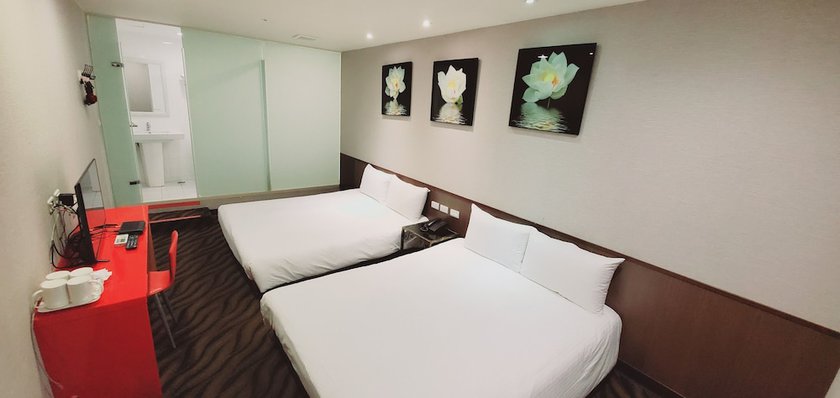 Imagen de la habitación del Hotel Ximen Garden. Foto 8