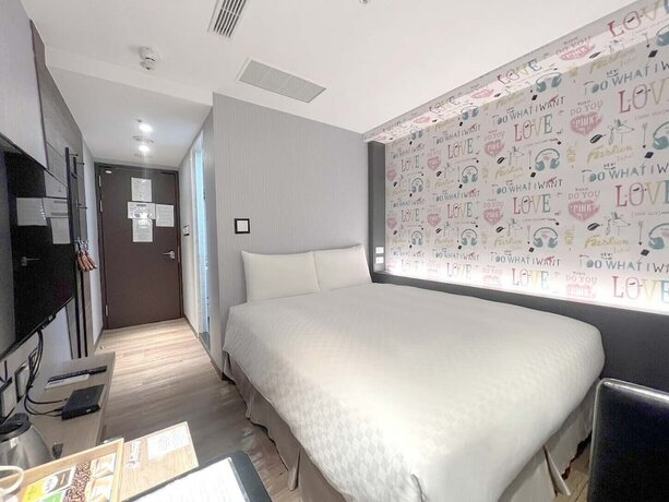 Imagen de la habitación del Hotel Ximen Hedo Kaifeng, Taipei. Foto 15