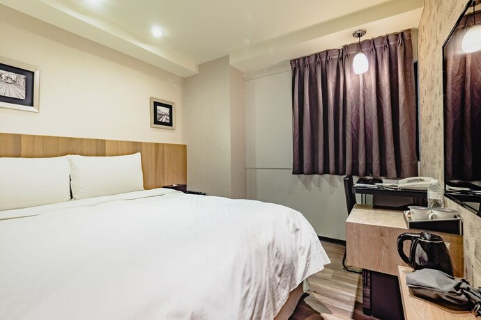 Imagen de la habitación del Hotel Ximen Hedo Kaifeng, Taipei. Foto 20