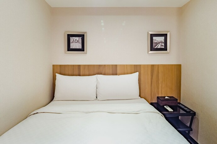 Imagen de la habitación del Hotel Ximen Hedo Kaifeng, Taipei. Foto 21