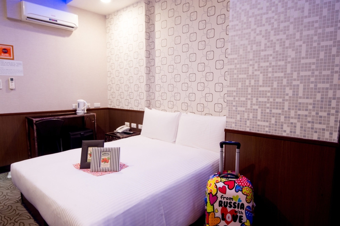 Imagen de la habitación del Hotel Ximen Holiday Fun. Foto 1