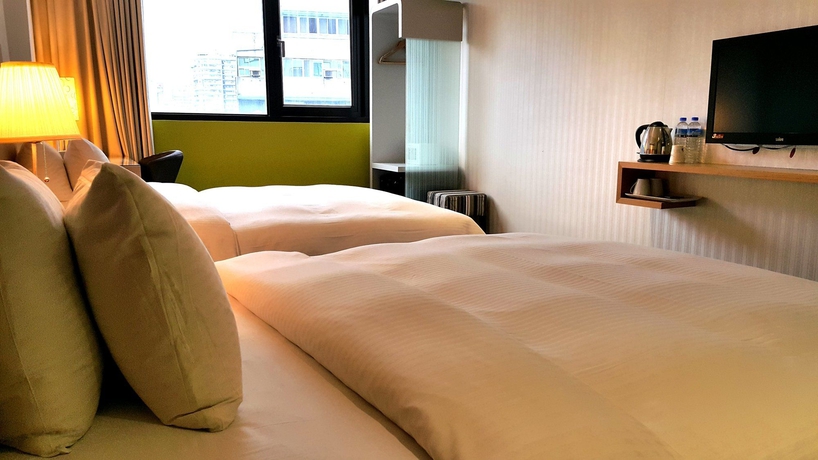 Imagen de la habitación del Hotel Ximen Relite. Foto 11