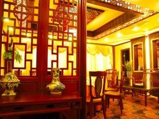 Imagen de la habitación del Hotel Xin Gang Holiday. Foto 11