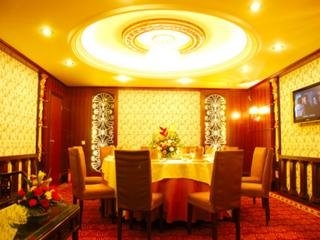 Imagen del bar/restaurante del Hotel Xin Gang Holiday. Foto 2