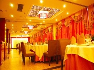 Imagen del bar/restaurante del Hotel Xin Gang Holiday. Foto 5