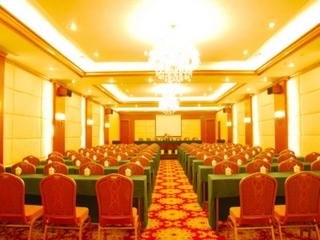 Imagen del bar/restaurante del Hotel Xin Gang Holiday. Foto 7
