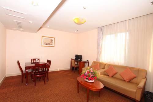 Imagen de la habitación del Hotel Xin Hua Guangzhou. Foto 1