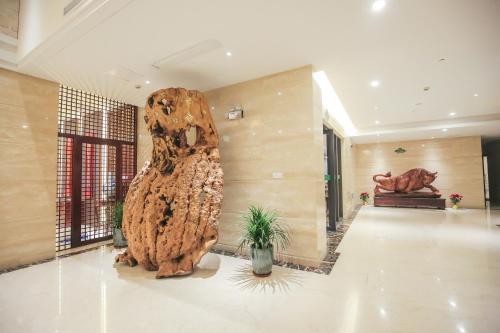 Imagen de la habitación del Hotel Xin Jue Jiayi. Foto 10