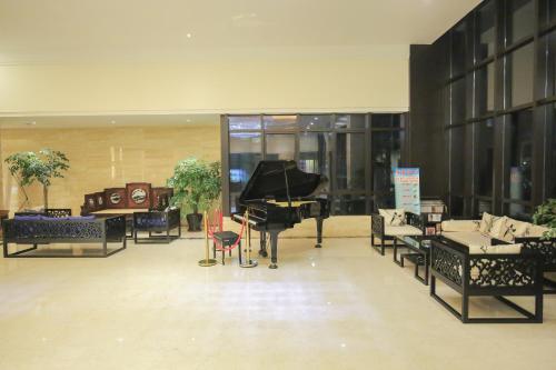 Imagen general del Hotel Xin Jue Jiayi. Foto 7