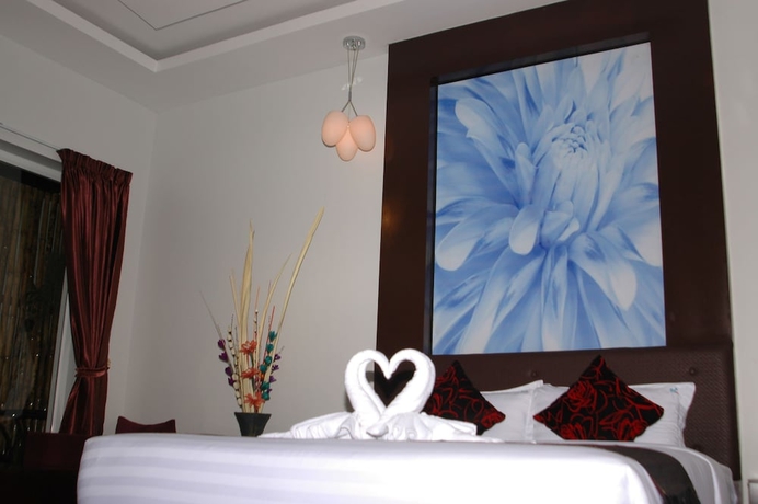 Imagen de la habitación del Hotel Xin Lan Xin. Foto 17