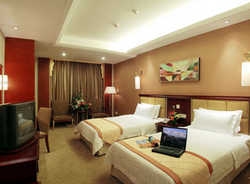 Imagen de la habitación del Hotel Xin Liang. Foto 5