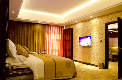 Imagen de la habitación del Hotel Xin Sheng Da Hong Sheng International. Foto 7