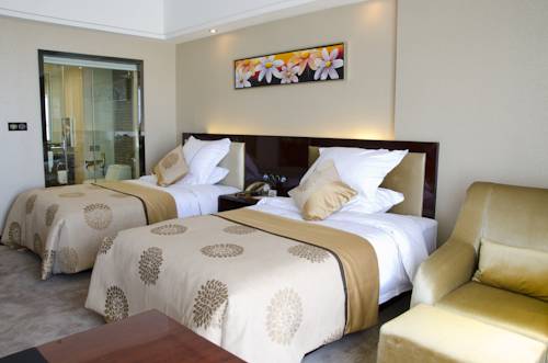 Imagen de la habitación del Hotel Xin Sheng Da Hong Sheng International. Foto 15