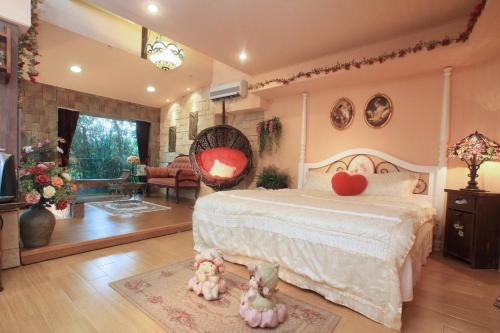Imagen de la habitación del Hotel Xin Yuan My Dream Castle. Foto 8