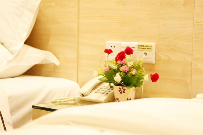 Imagen de la habitación del Hotel Xin Yue Xin. Foto 2