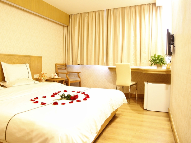 Imagen de la habitación del Hotel Xin Yue Xin. Foto 3