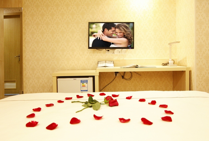 Imagen de la habitación del Hotel Xin Yue Xin. Foto 4