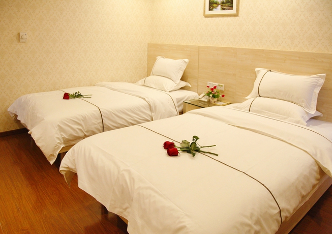 Imagen de la habitación del Hotel Xin Yue Xin. Foto 8