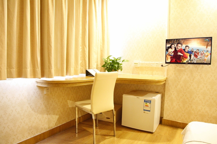 Imagen de la habitación del Hotel Xin Yue Xin. Foto 10