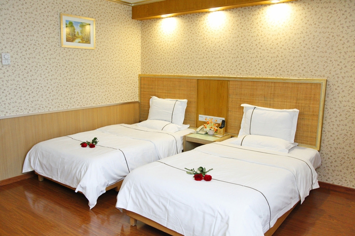 Imagen de la habitación del Hotel Xin Yue Xin. Foto 11