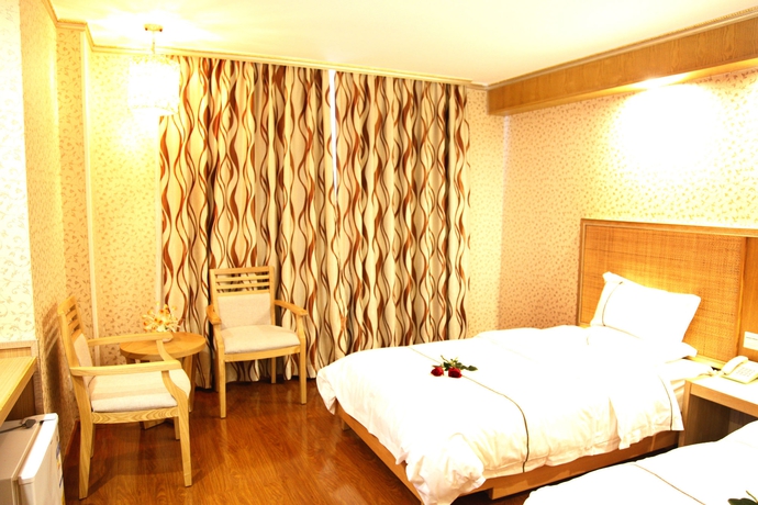 Imagen de la habitación del Hotel Xin Yue Xin. Foto 13