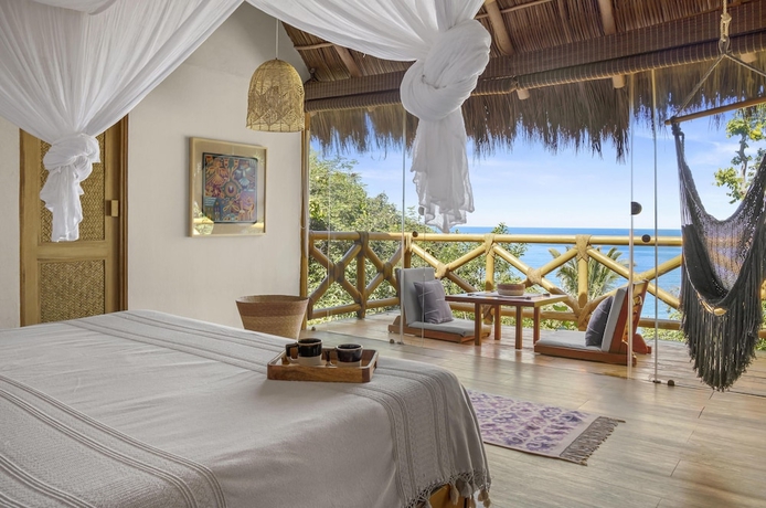 Imagen de la habitación del Hotel Xinalani. Foto 5