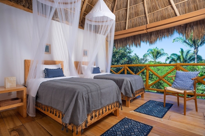 Imagen de la habitación del Hotel Xinalani. Foto 12