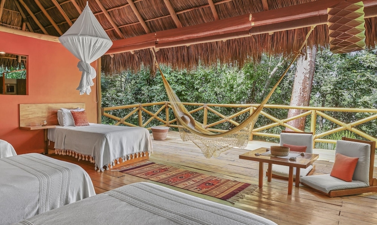 Imagen de la habitación del Hotel Xinalani. Foto 15