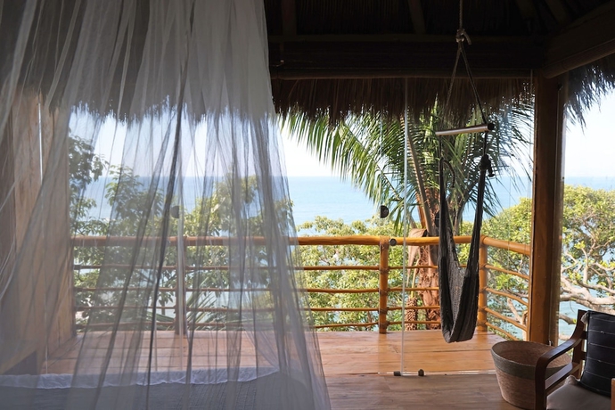 Imagen de la habitación del Hotel Xinalani. Foto 17