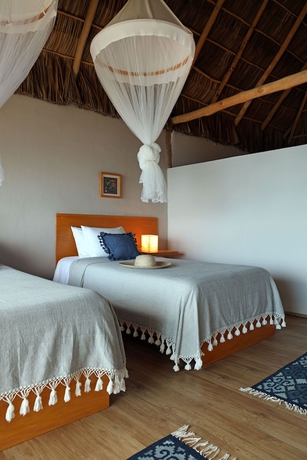 Imagen de la habitación del Hotel Xinalani. Foto 18