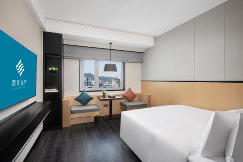 Imagen de la habitación del Hotel Xin\'an Yihao - Xiamen Railway Station Mixc City Store. Foto 17