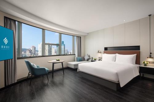 Imagen de la habitación del Hotel Xin\'an Yihao - Xiamen Railway Station Mixc City Store. Foto 19