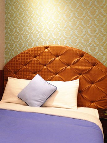 Imagen de la habitación del Hotel Xing Ji Bungalow. Foto 2