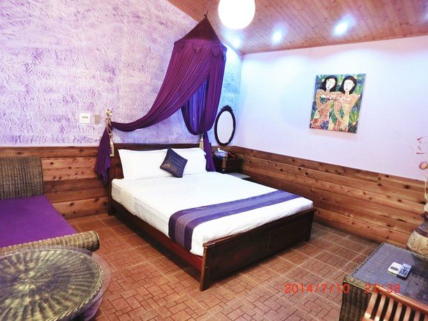 Imagen de la habitación del Hotel Xing Ji Bungalow. Foto 3