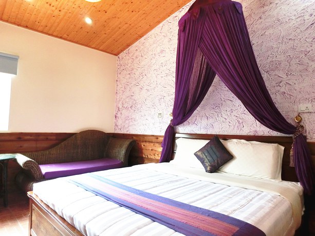 Imagen de la habitación del Hotel Xing Ji Bungalow. Foto 6