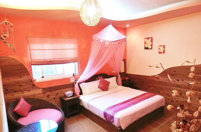 Imagen de la habitación del Hotel Xing Ji Bungalow. Foto 12