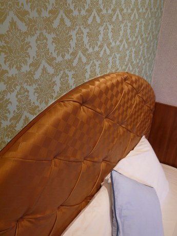 Imagen de la habitación del Hotel Xing Ji Bungalow. Foto 13