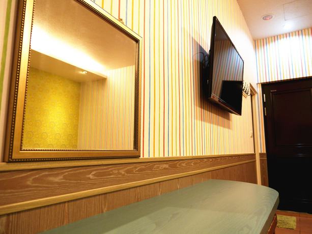 Imagen de la habitación del Hotel Xing Ji Bungalow. Foto 15