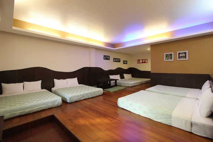 Imagen de la habitación del Hotel Xing Ji Bungalow. Foto 18