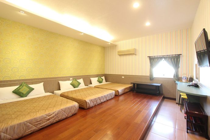 Imagen de la habitación del Hotel Xing Ji Bungalow. Foto 19