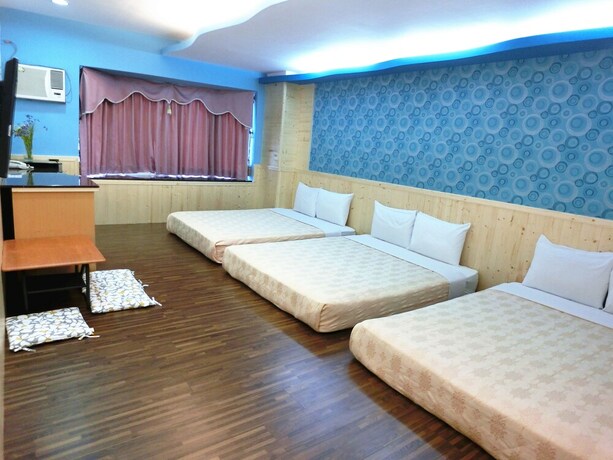 Imagen de la habitación del Hotel Xing Ji. Foto 12