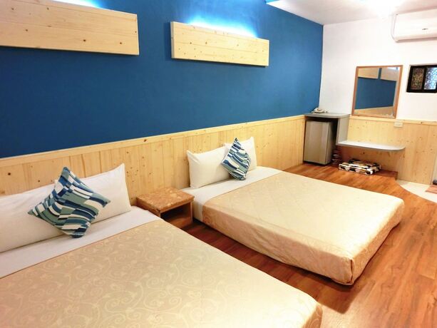 Imagen de la habitación del Hotel Xing Ji. Foto 14